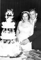Gary & Ginny cutting wedding cake